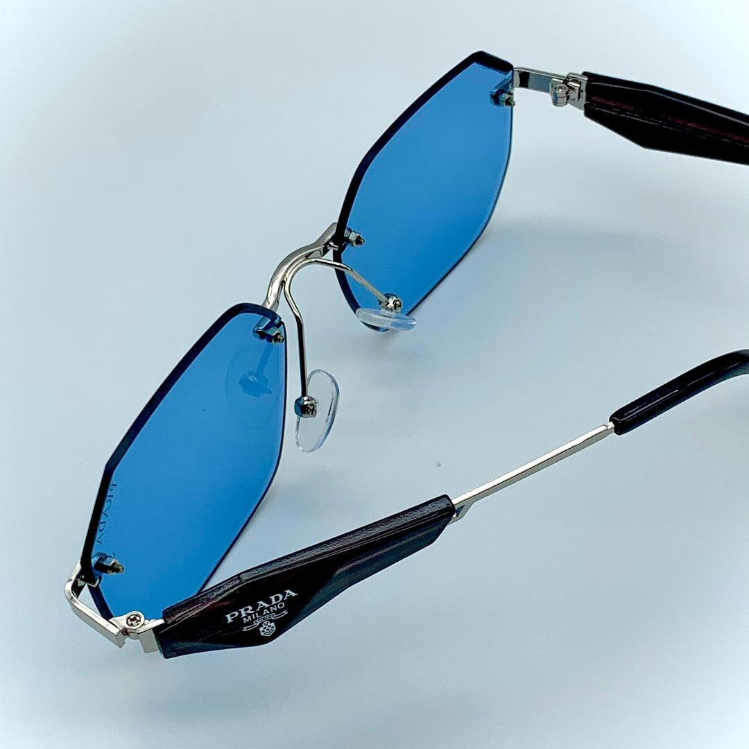 Solaires: Prada Blue Frame