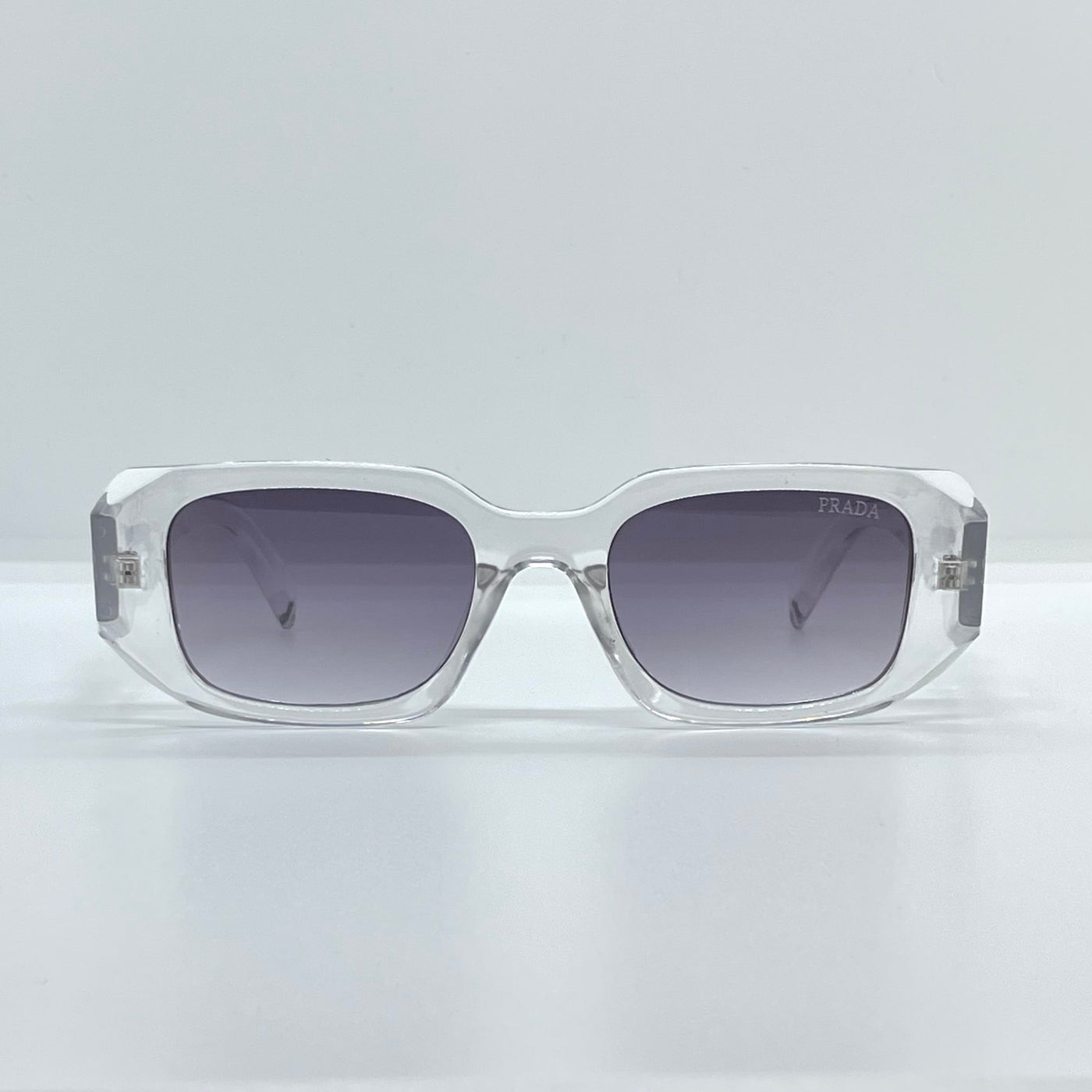 Solaires: Prada Symbole Grey