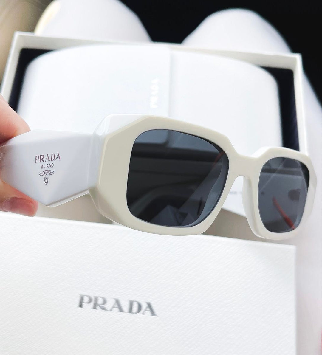 Solaires: Prada Symbole White
