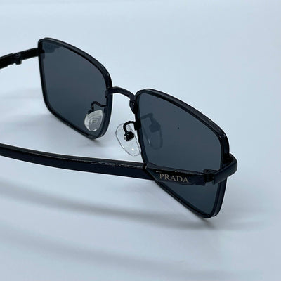 Solaires: Prada Rectangle Iconique Black