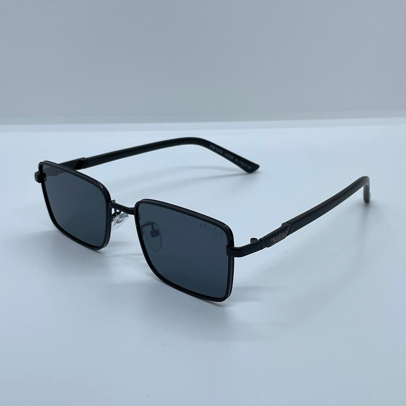 Solaires: Prada Rectangle Iconique Black