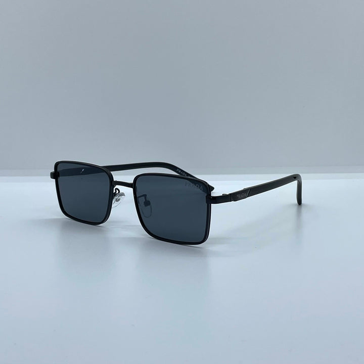 Solaires: Prada Rectangle Iconique Black