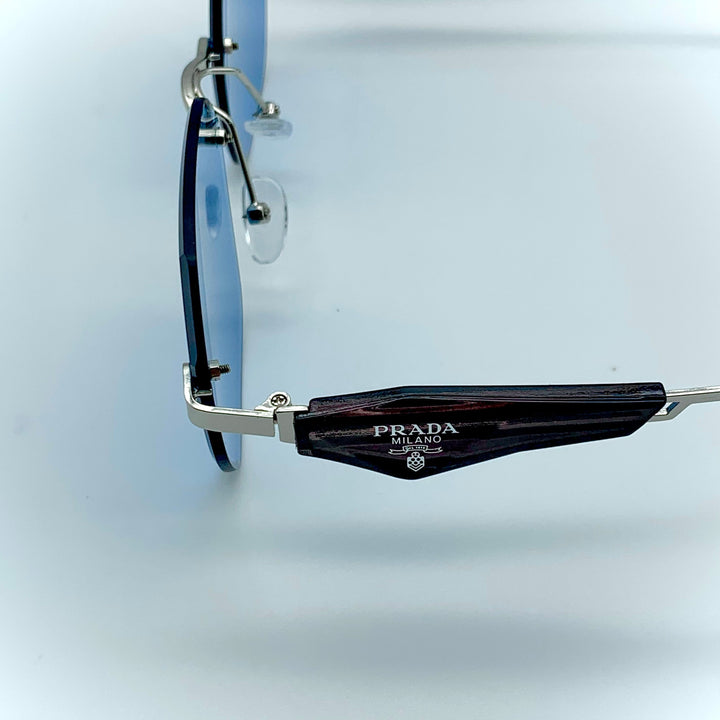 Solaires: Prada Blue Frame
