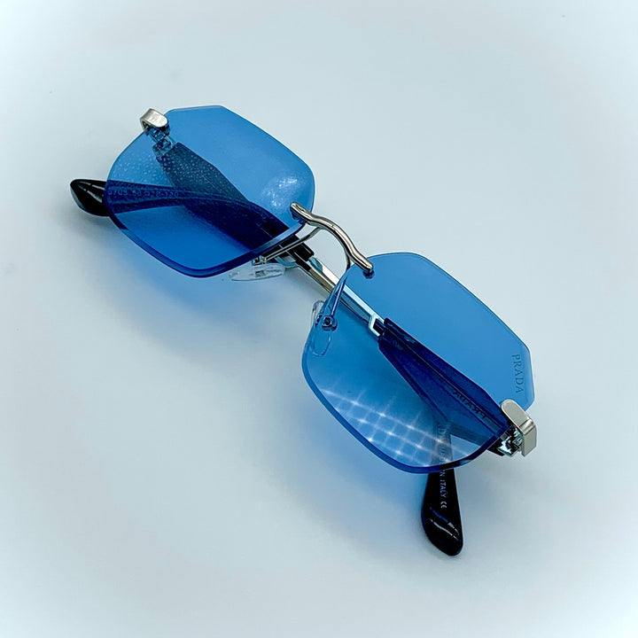 Solaires: Prada Blue Frame